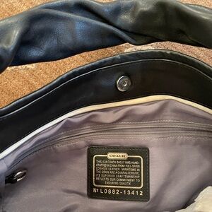 Coach black leather handbag.